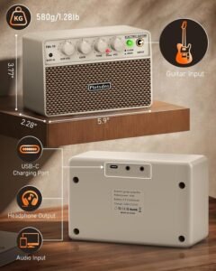 Flatsons FBA-10 white portable guitar amp with electric guitar on table showing USB-C port and control panel