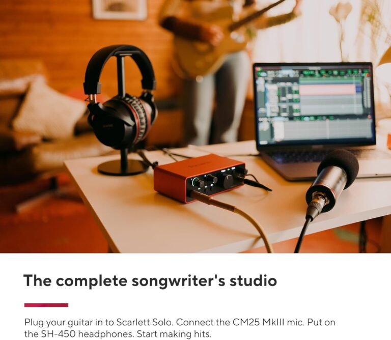Guitarist developing original songs during a home practice session