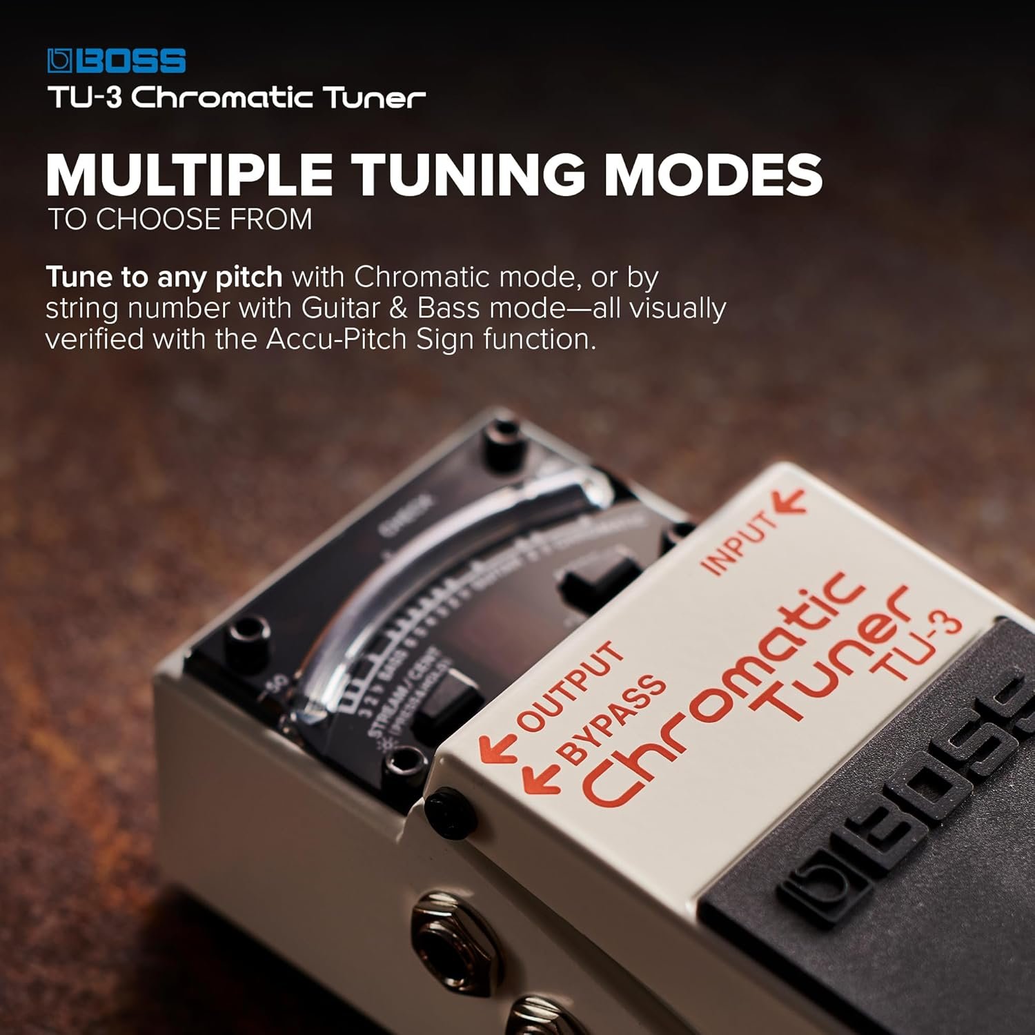 BOSS TU-3 chromatic tuner pedal on a pedalboard with 21-segment LED meter display